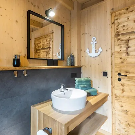 Oberwald Chalets 4 *